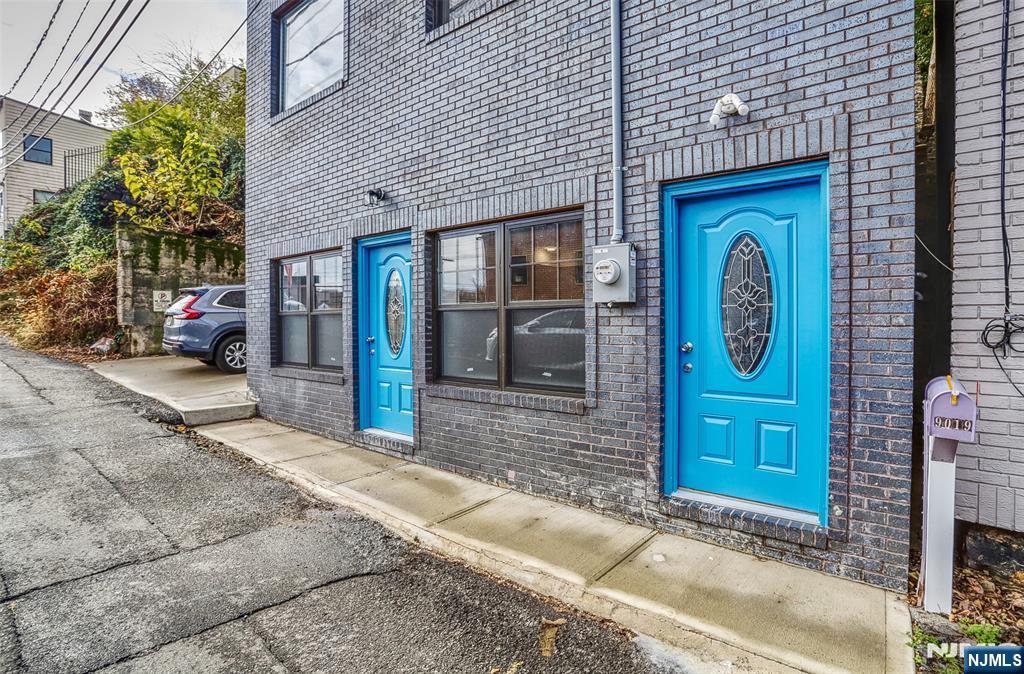 9017 Riverside Place North Bergen, NJ 07047 - Photo 2 of 27 a front view of a house