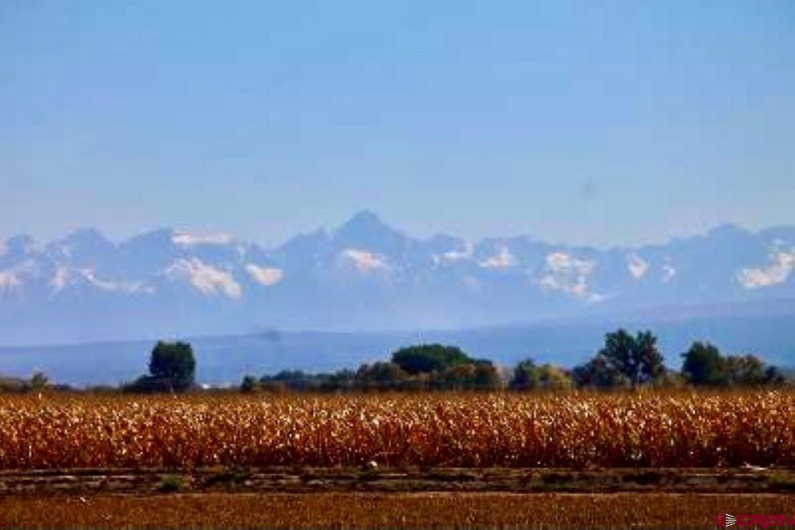 Lot 2 Banner Road Delta, CO 81425 - Photo 1 of 12 a view of a lake with sunset