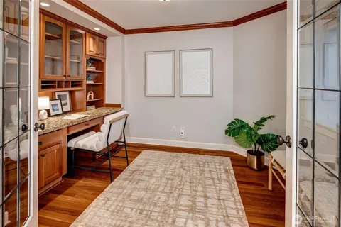 a view of a workspace with furniture