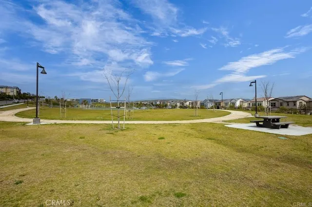 a view of a swimming pool with an outdoor seating