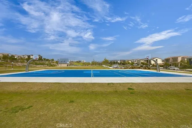a view of an ocean and a building in the background