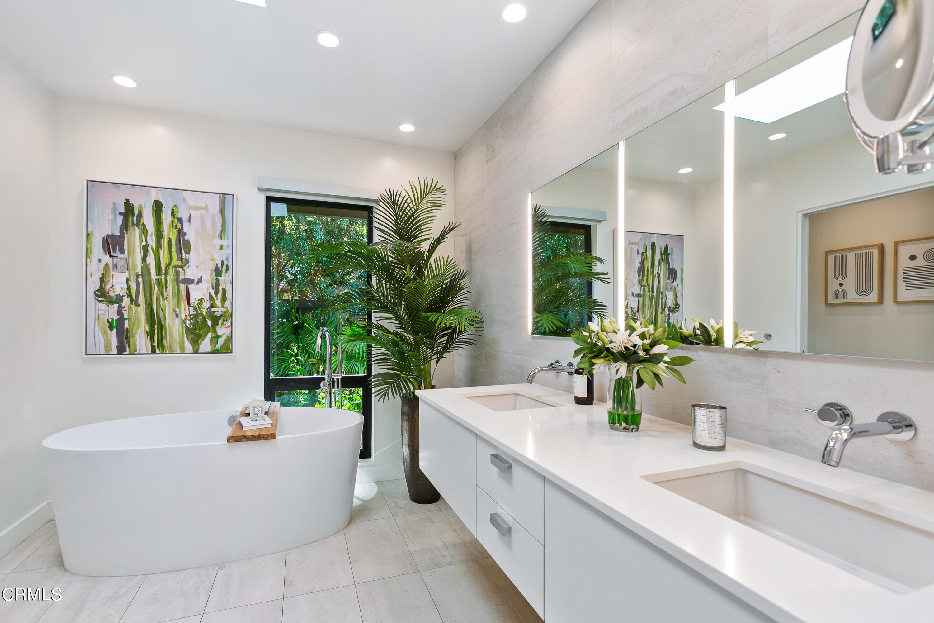 1240 Chateau Road Pasadena, CA 91105 - Photo 19 of 30 a bathroom with a large tub a sink and potted plant
