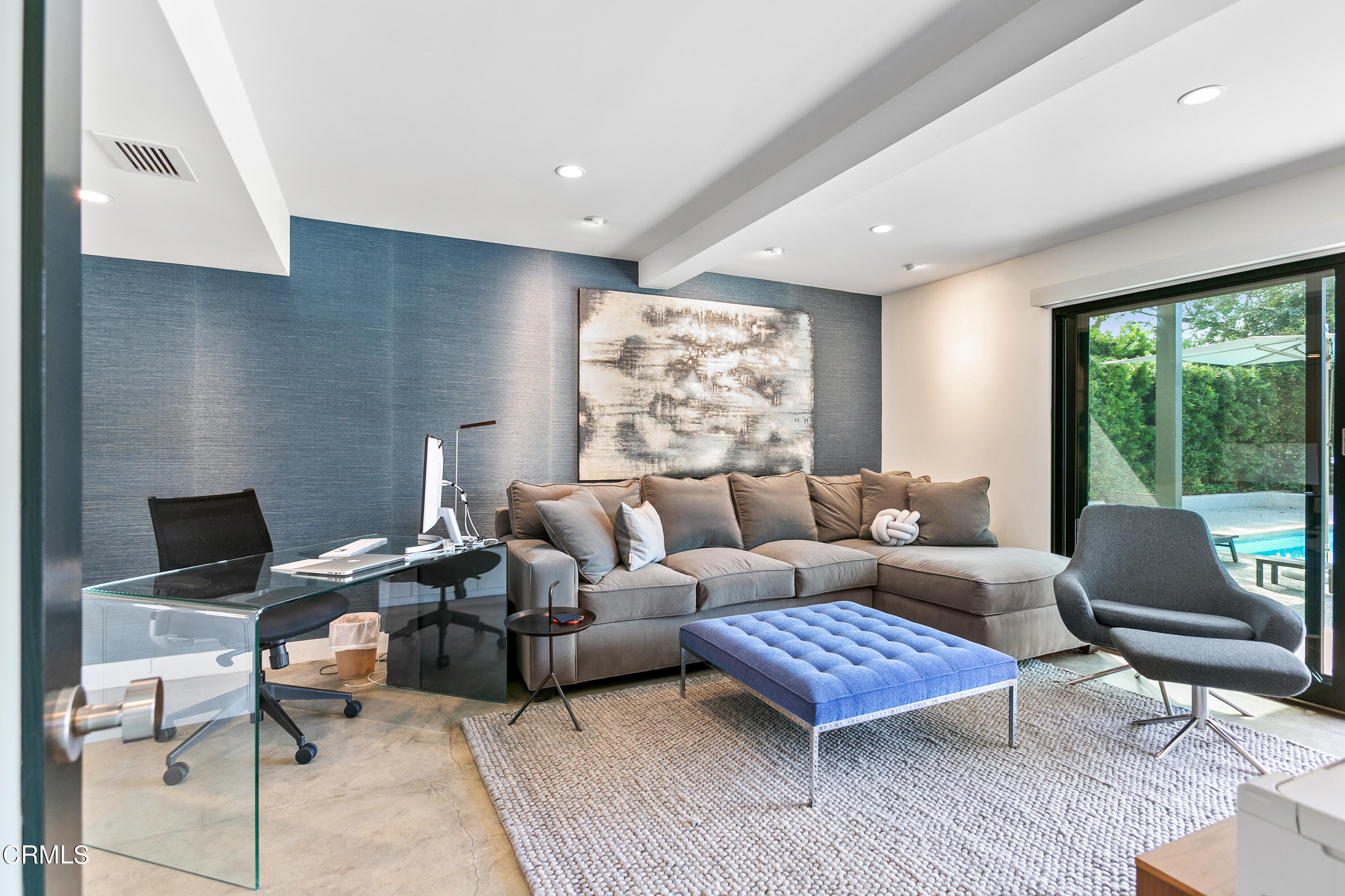 1240 Chateau Road Pasadena, CA 91105 - Photo 24 of 30 a living room with furniture rug and window