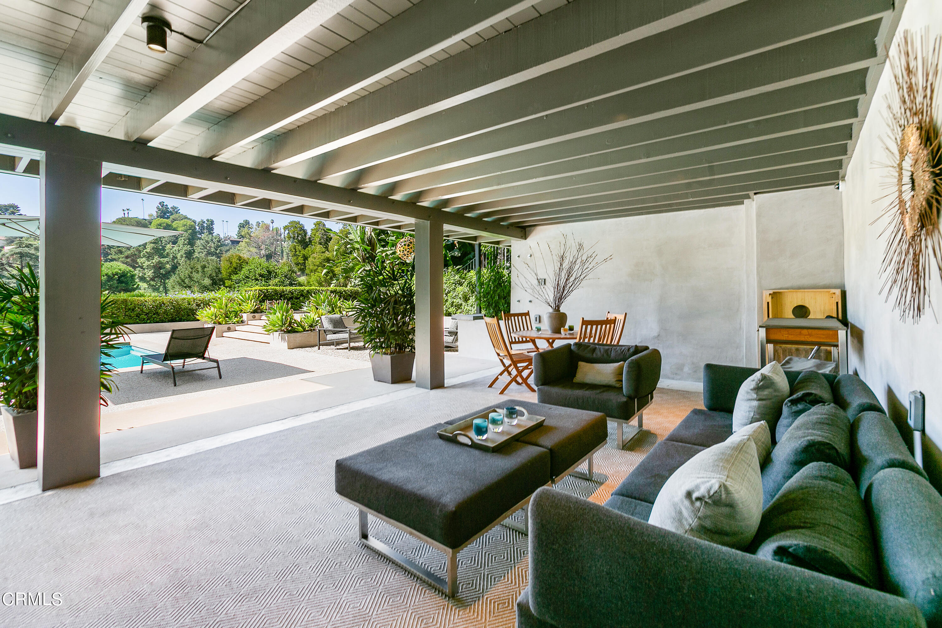 1240 Chateau Road Pasadena, CA 91105 - Photo 25 of 30 a living room with furniture and a large window