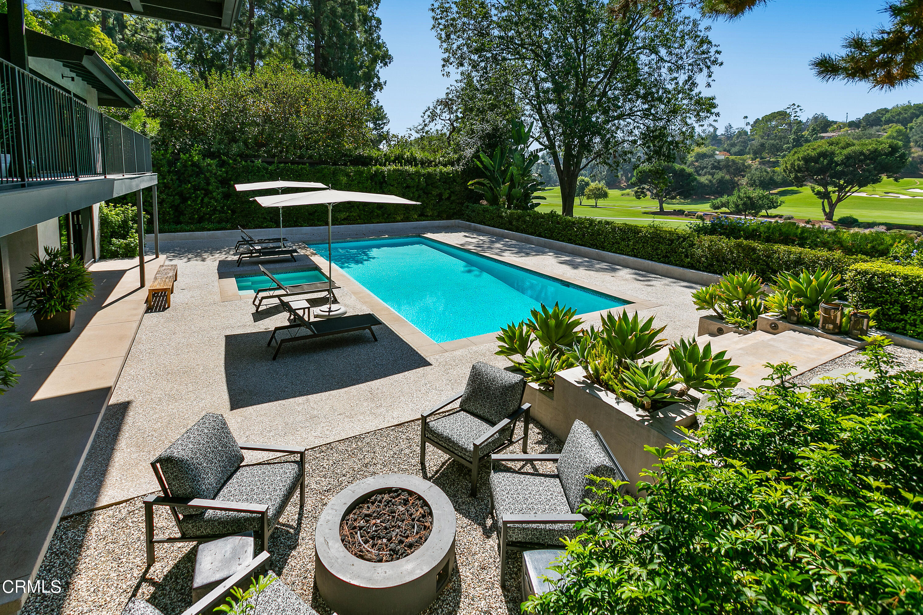 1240 Chateau Road Pasadena, CA 91105 - Photo 27 of 30 a view of a swimming pool with a patio