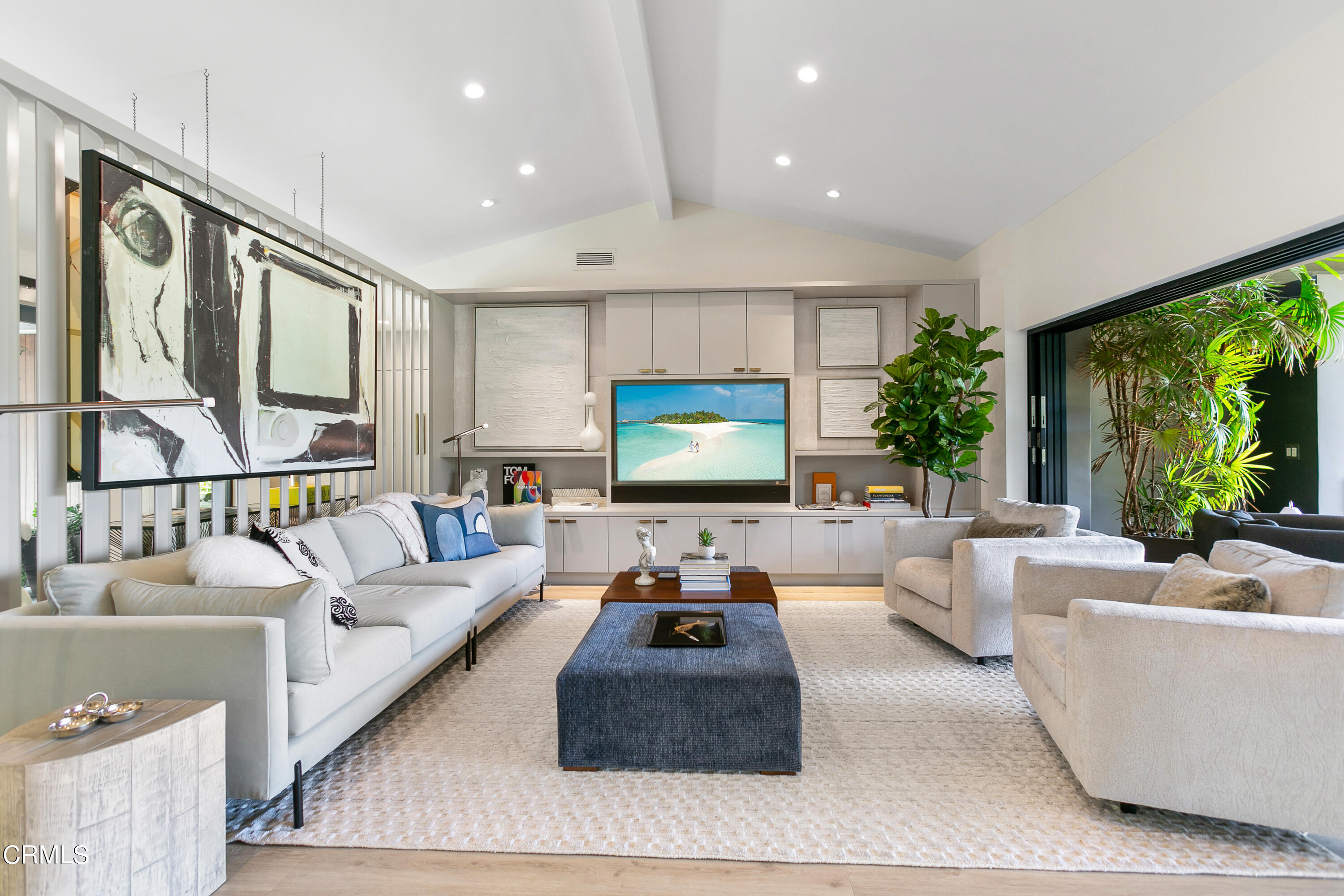 1240 Chateau Road Pasadena, CA 91105 - Photo 6 of 30 a living room with furniture flat screen tv and a large window