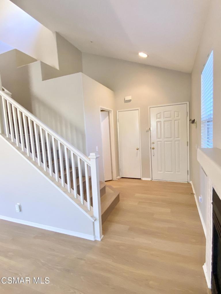 273 Springmist Lane Simi Valley, CA 93065 - Photo 4 of 14 a view of an empty room with stairs and a window