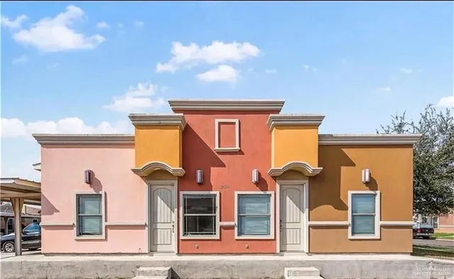 front view of a house with an empty space