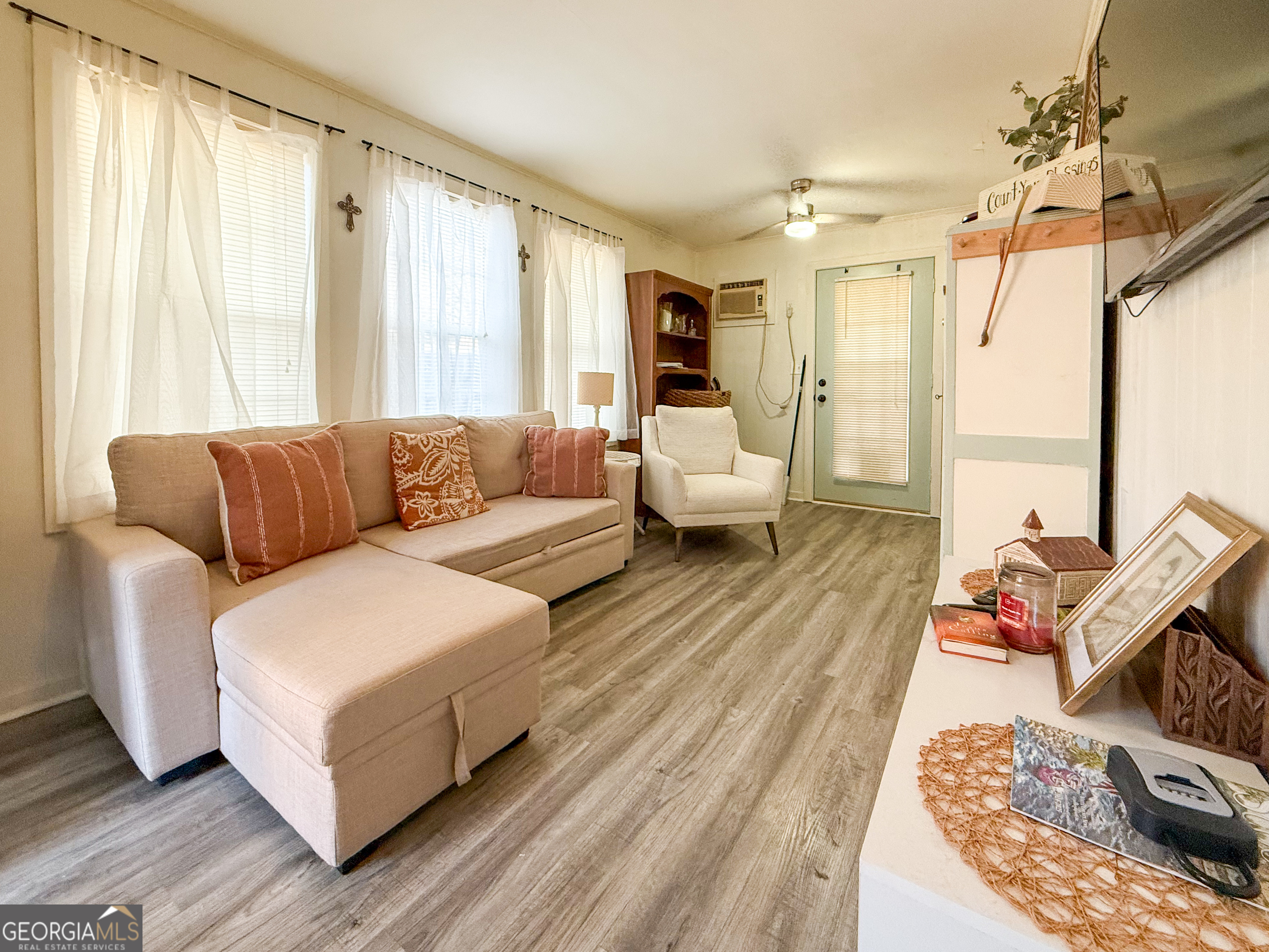 227 Canyon Pass Cleveland, GA 30528 - Photo 6 of 15 a living room with furniture and wooden floor
