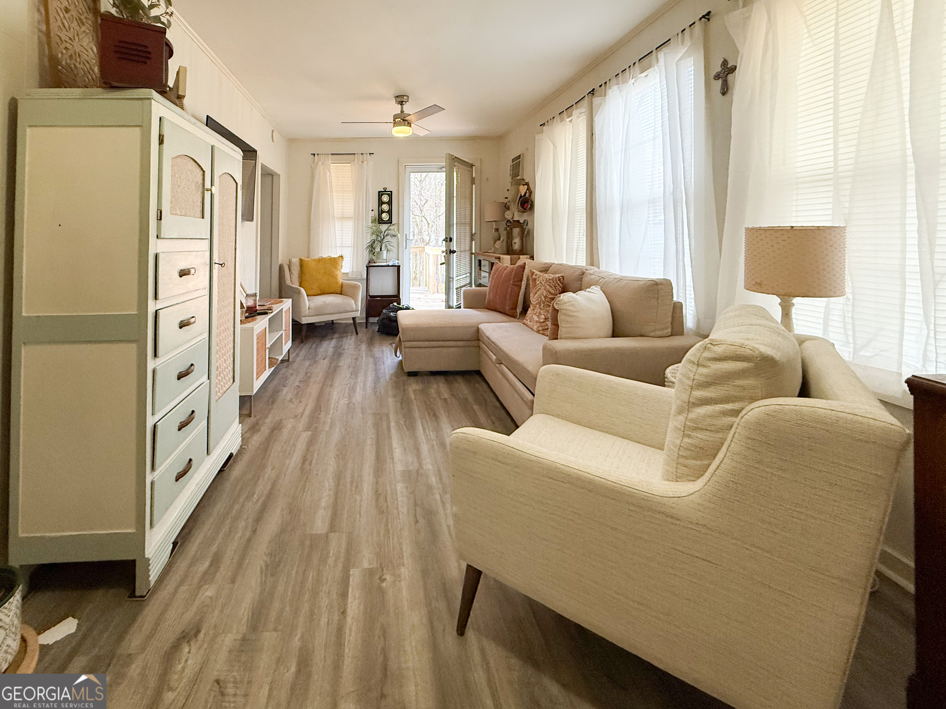 227 Canyon Pass Cleveland, GA 30528 - Photo 7 of 15 a living room with furniture and a large window