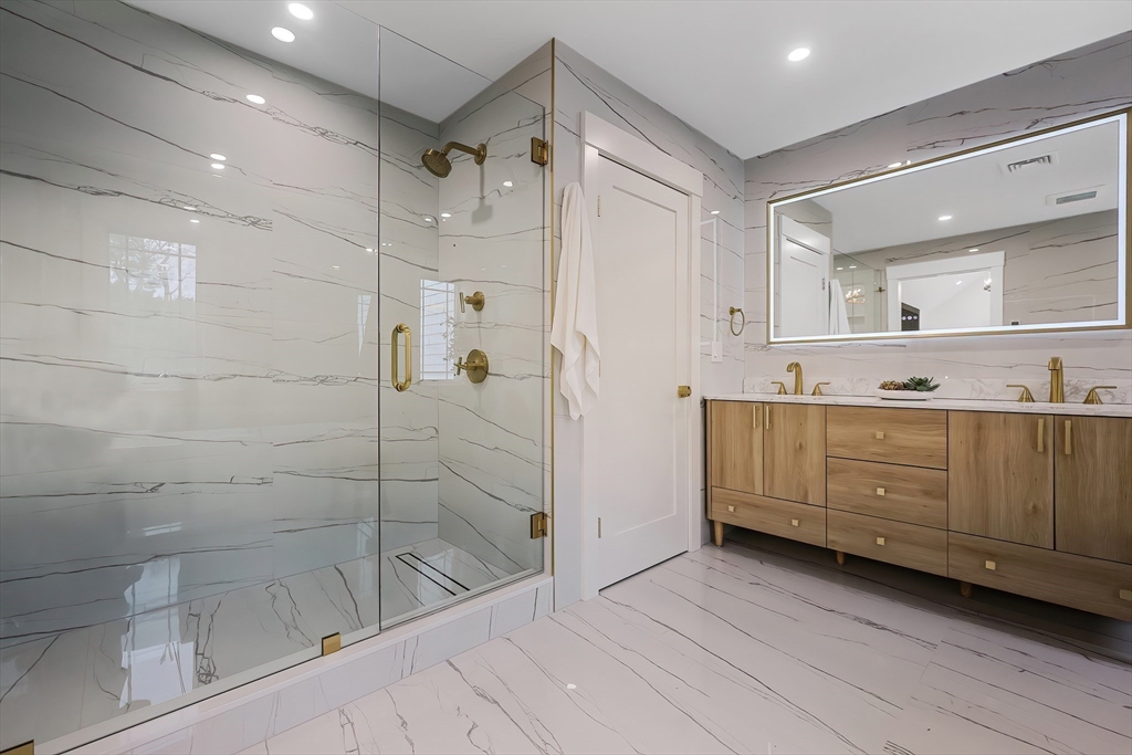 54 Spywood Road Sherborn, MA 01770 - Photo 25 of 41 a bathroom with a shower a sink and a mirror