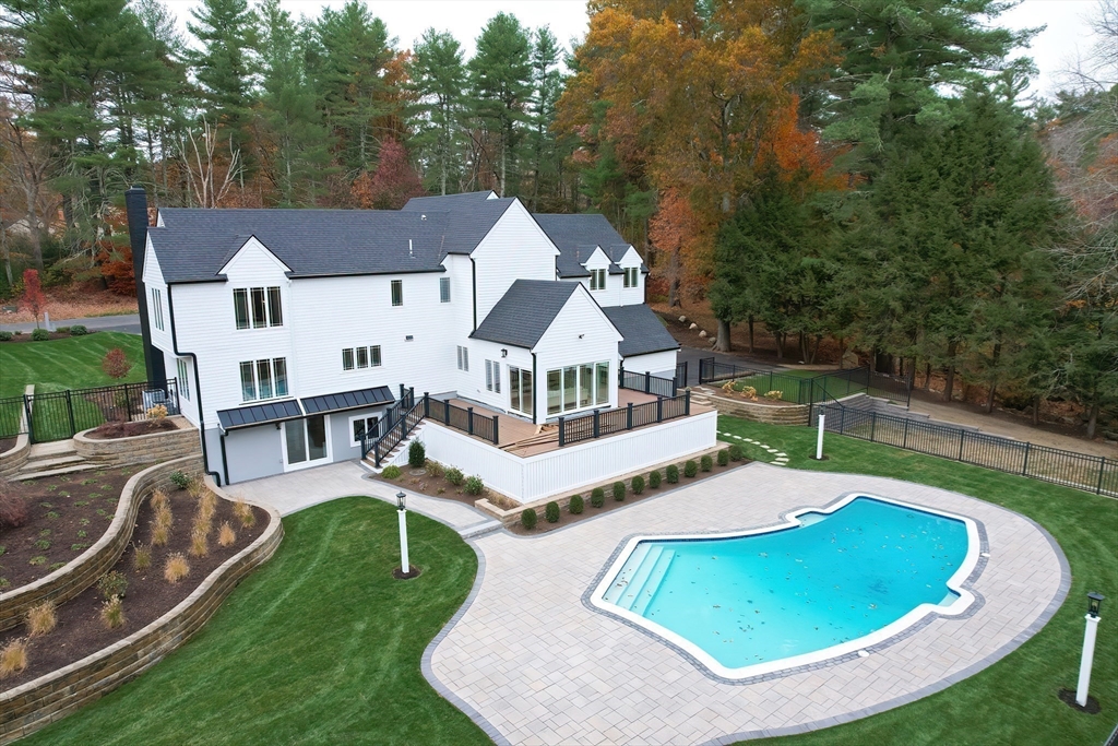 54 Spywood Road Sherborn, MA 01770 - Photo 37 of 41 a view of a house with swimming pool and porch