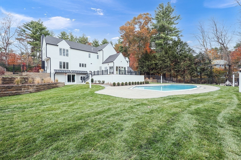 54 Spywood Road Sherborn, MA 01770 - Photo 38 of 41 a view of house with outdoor space and garden