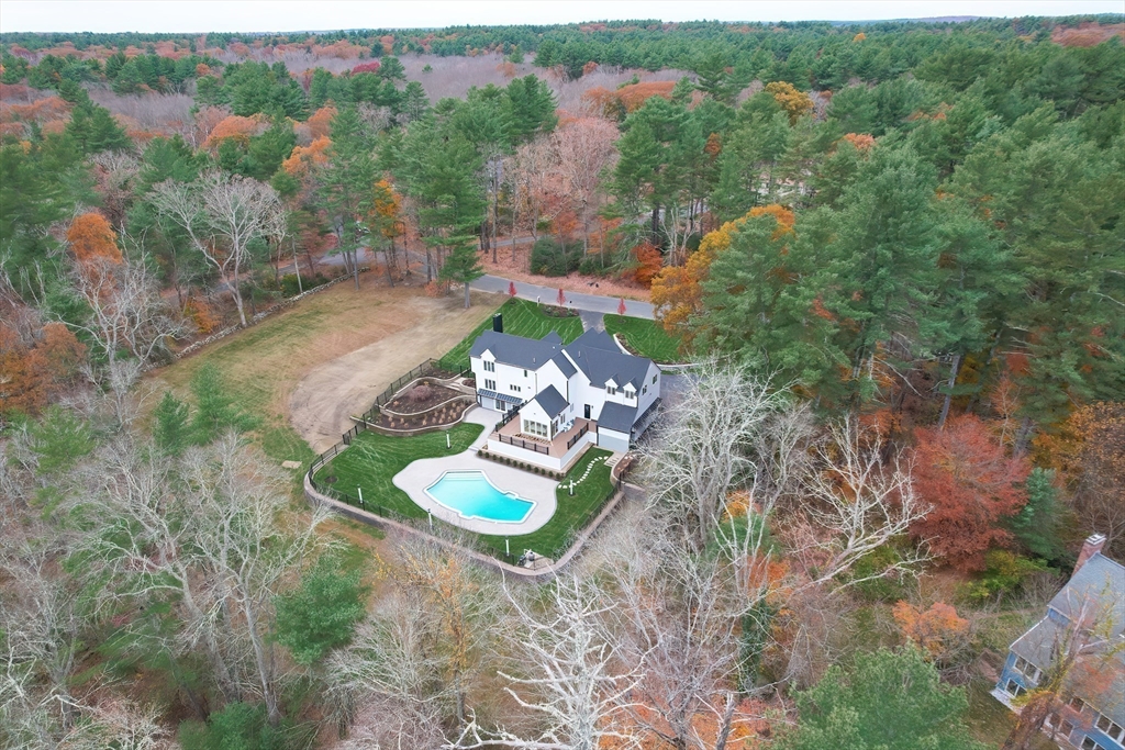 54 Spywood Road Sherborn, MA 01770 - Photo 39 of 41 an aerial view of a house with a yard
