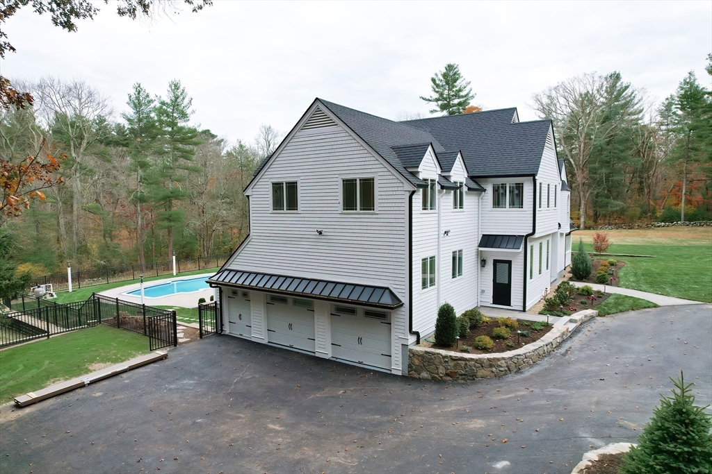 54 Spywood Road Sherborn, MA 01770 - Photo 40 of 41 a view of a house with backyard and garden