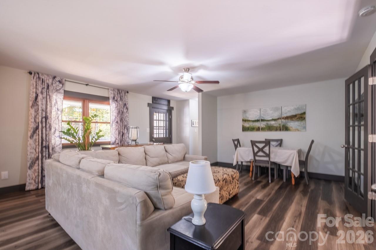 240 Eldon Lane Salisbury, NC 28144 - Photo 11 of 41 a living room with furniture and a chandelier