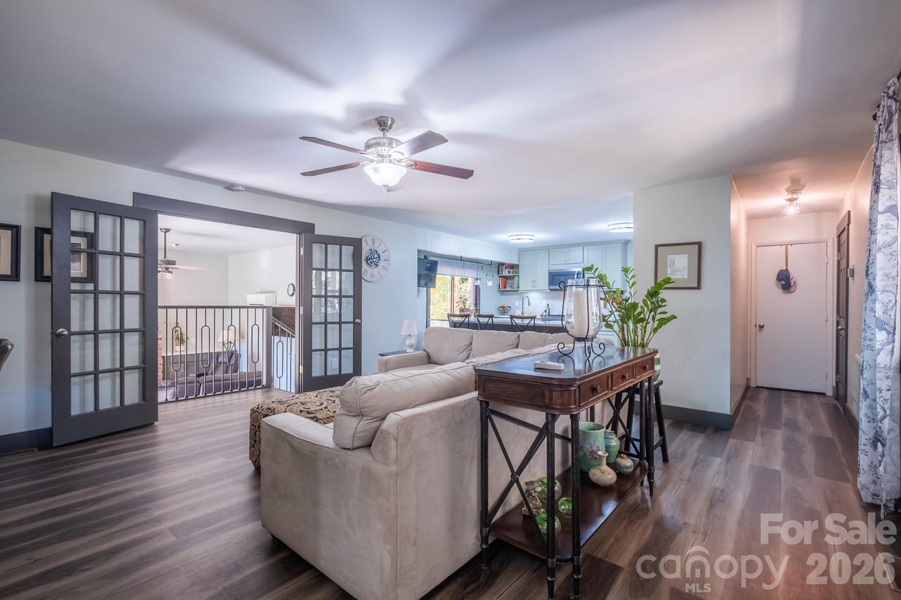 240 Eldon Lane Salisbury, NC 28144 - Photo 13 of 41 a living room with furniture and a wooden floor