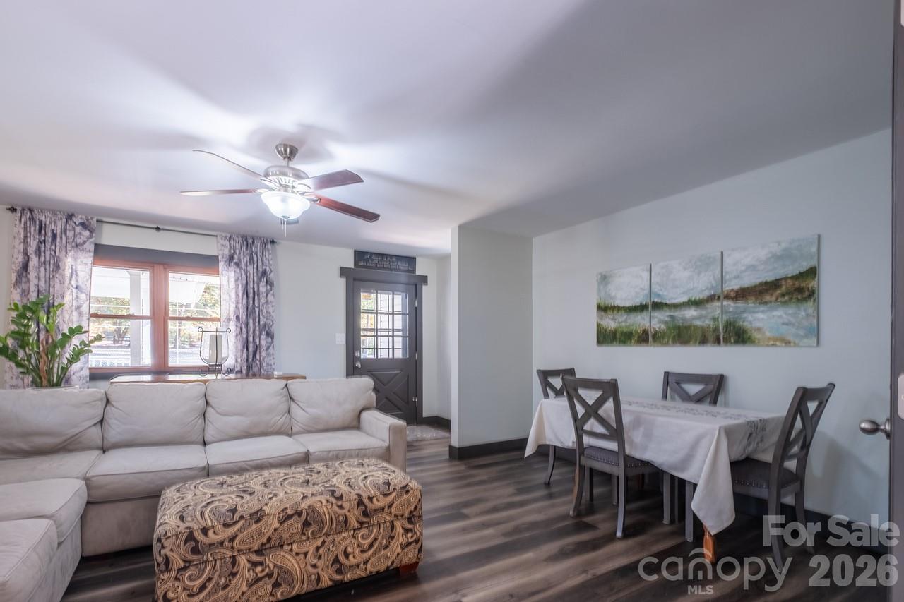 240 Eldon Lane Salisbury, NC 28144 - Photo 14 of 41 a living room with furniture and a chandelier