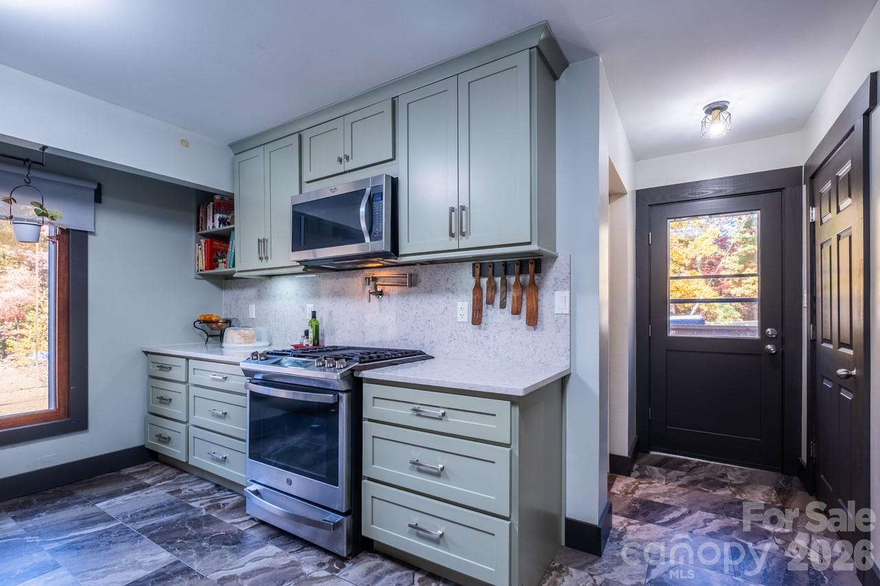 240 Eldon Lane Salisbury, NC 28144 - Photo 16 of 41 a kitchen with stainless steel appliances granite countertop a stove and a microwave
