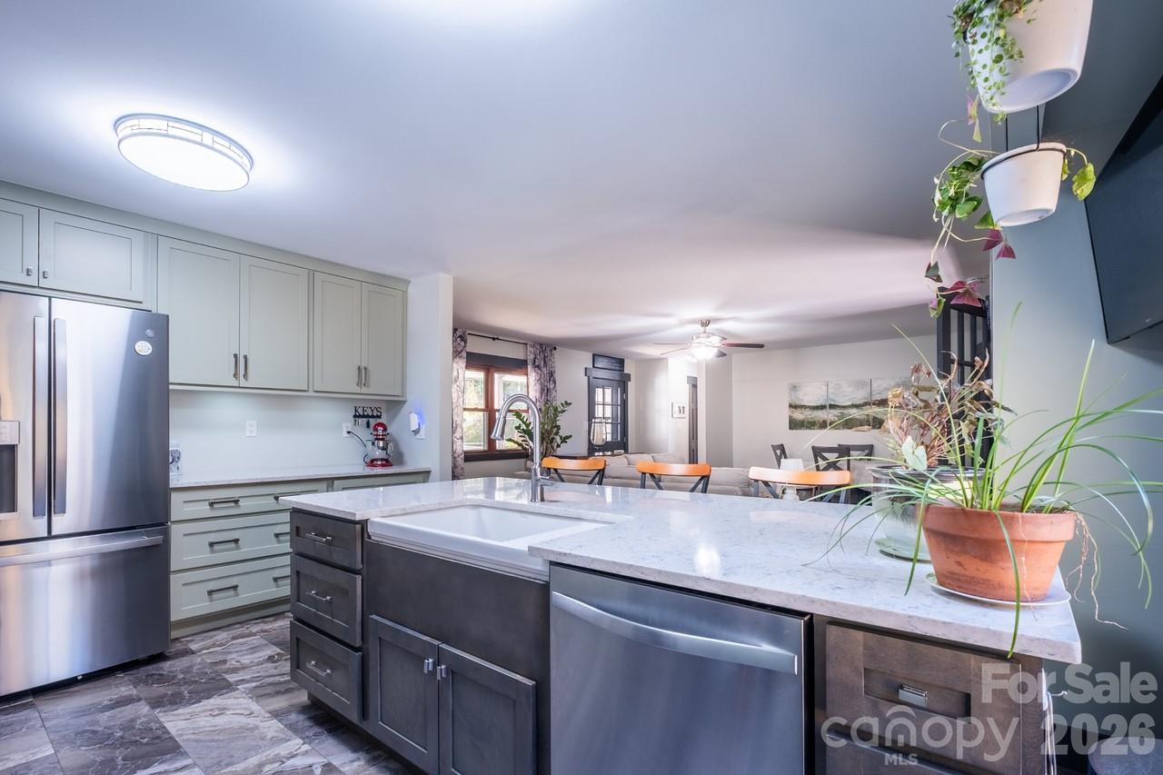 240 Eldon Lane Salisbury, NC 28144 - Photo 19 of 41 a kitchen with sink refrigerator and cabinets