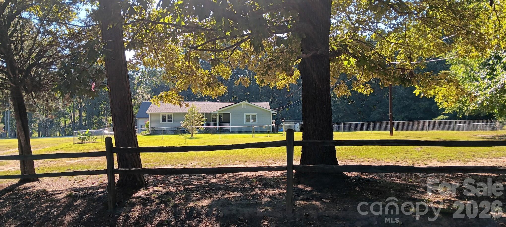 240 Eldon Lane Salisbury, NC 28144 - Photo 2 of 41 a view of an swimming pool with a patio