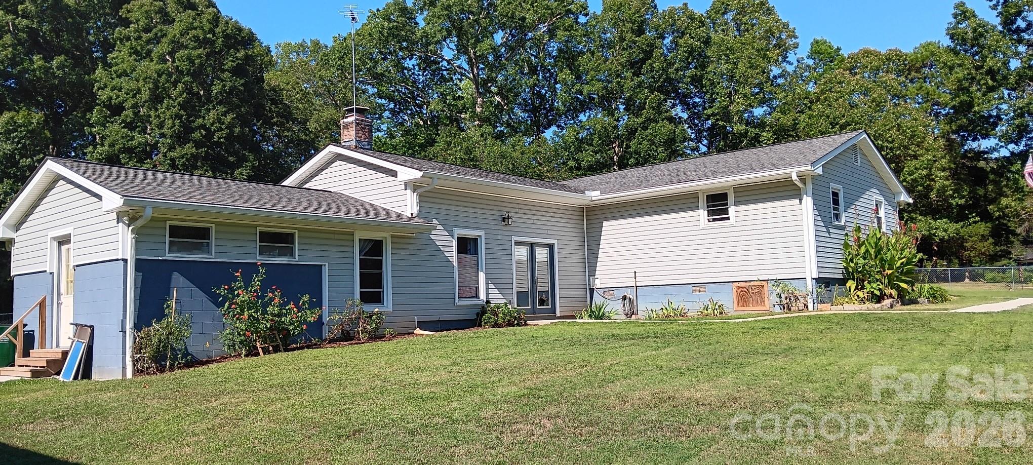 240 Eldon Lane Salisbury, NC 28144 - Photo 3 of 41 a view of a house with pool and garden