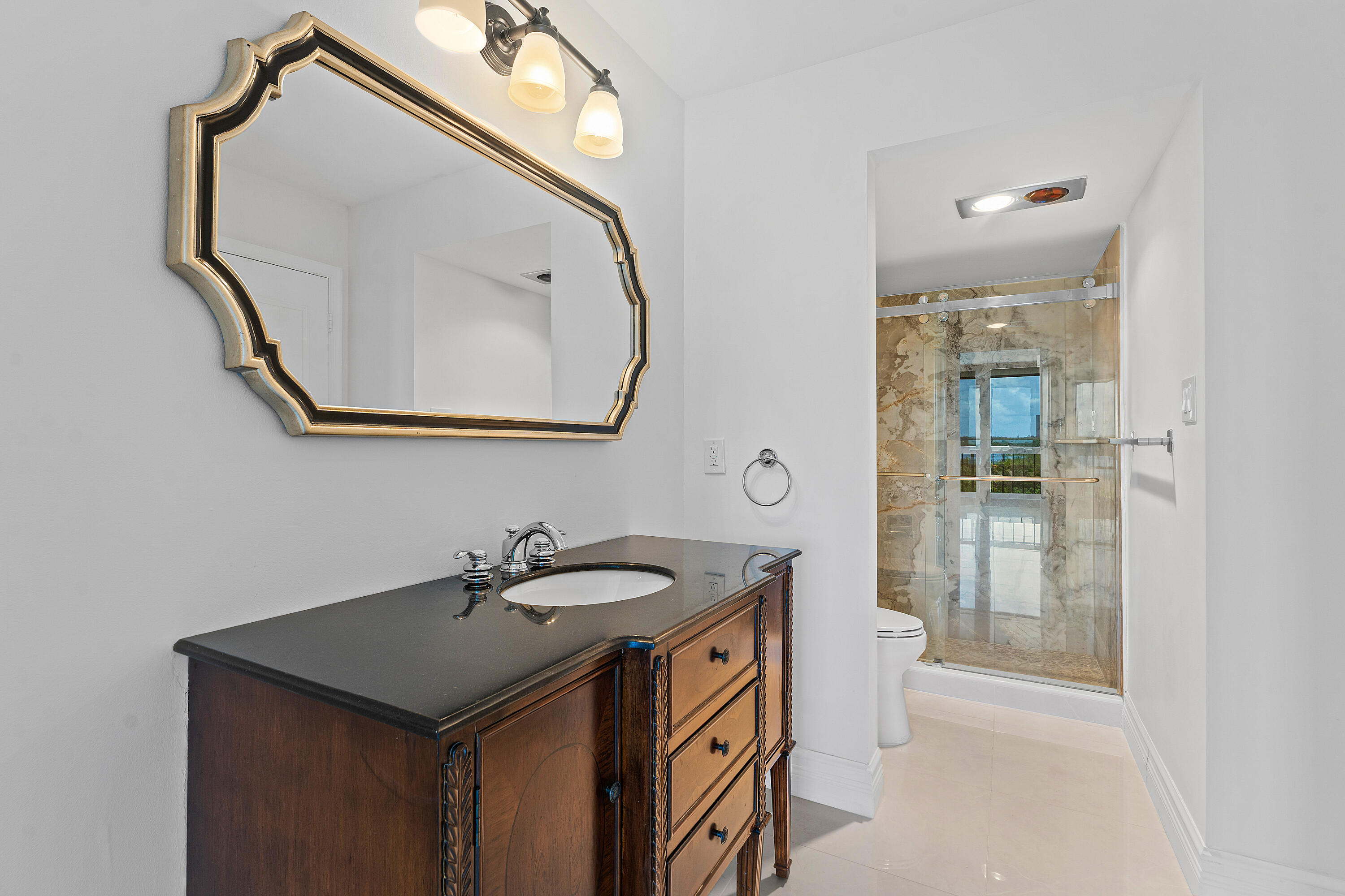 5380 North Ocean Drive, Unit 5A Riviera Beach, FL 33404 - Photo 23 of 38 Secondary Bathroom