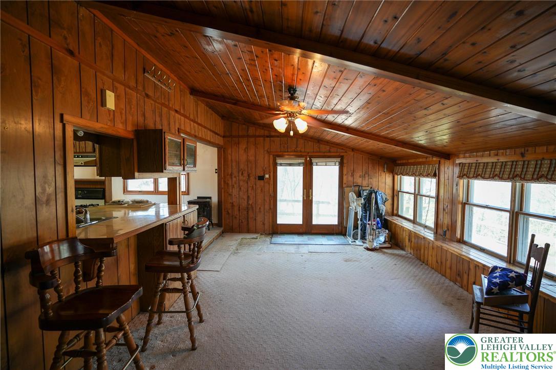 8245 Interchange Road Lehighton, PA 18235 - Photo 18 of 35 a view of a dining room with furniture window and wooden floor