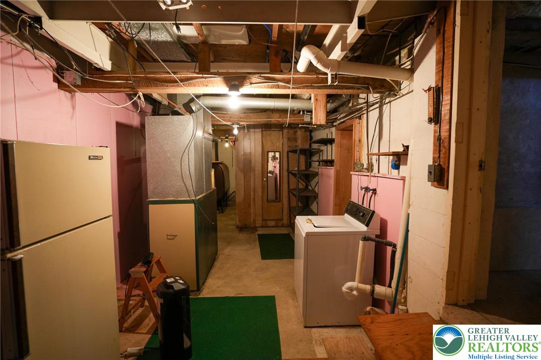 8245 Interchange Road Lehighton, PA 18235 - Photo 32 of 35 a view of a refrigerator with storage and utility room