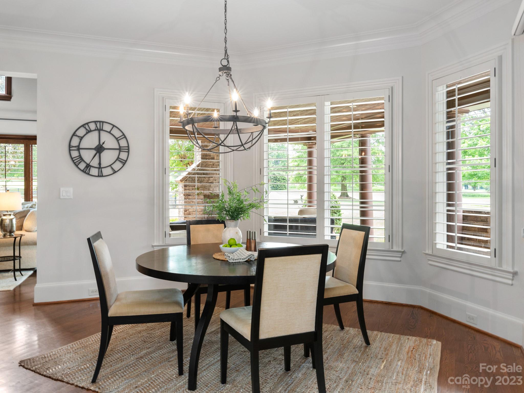 304 Eagle Bend Drive Waxhaw, NC 28173 - Photo 14 of 48 a view of a dining room with furniture window and wooden floor