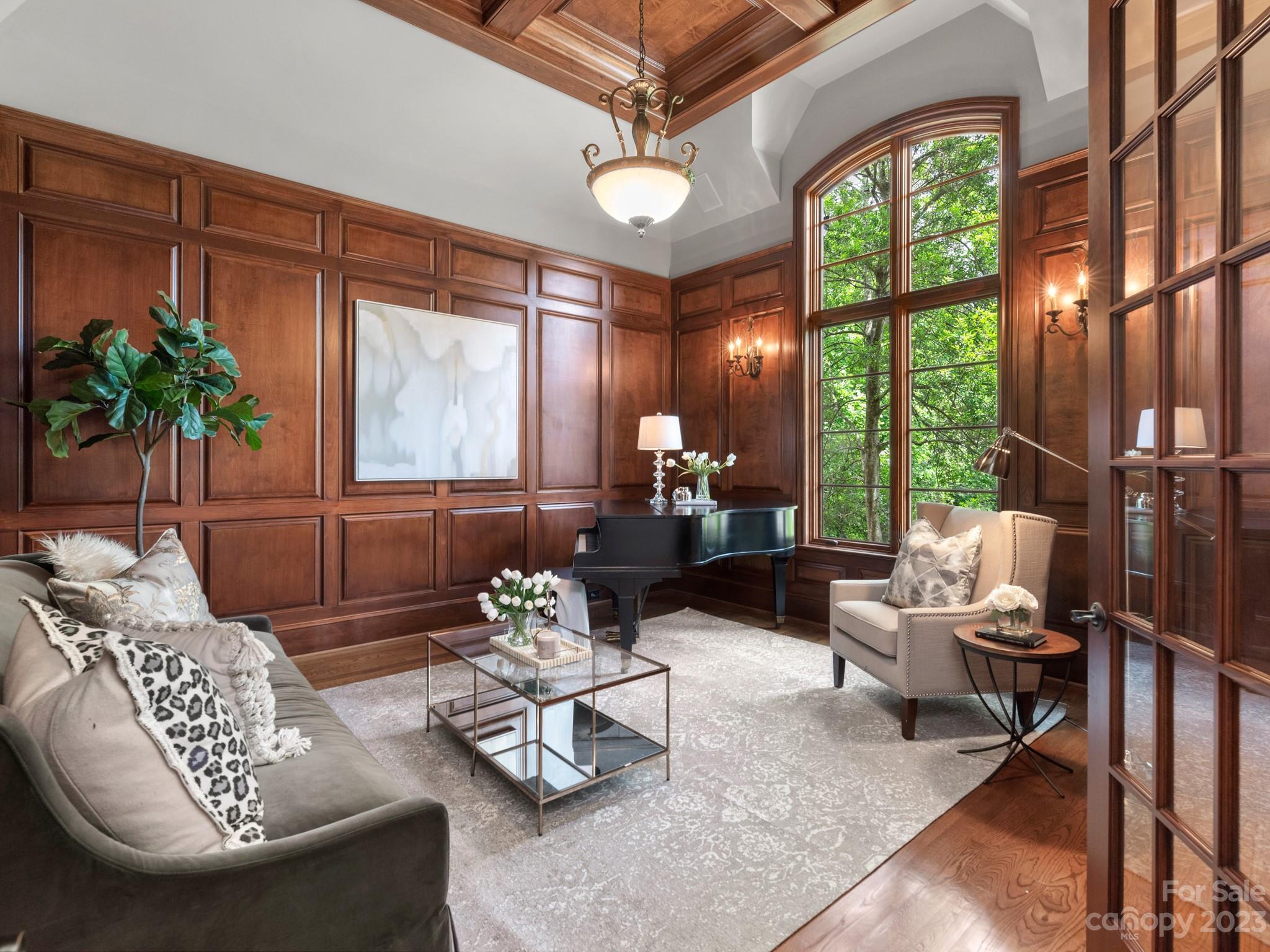 304 Eagle Bend Drive Waxhaw, NC 28173 - Photo 24 of 48 a living room with furniture and a large window