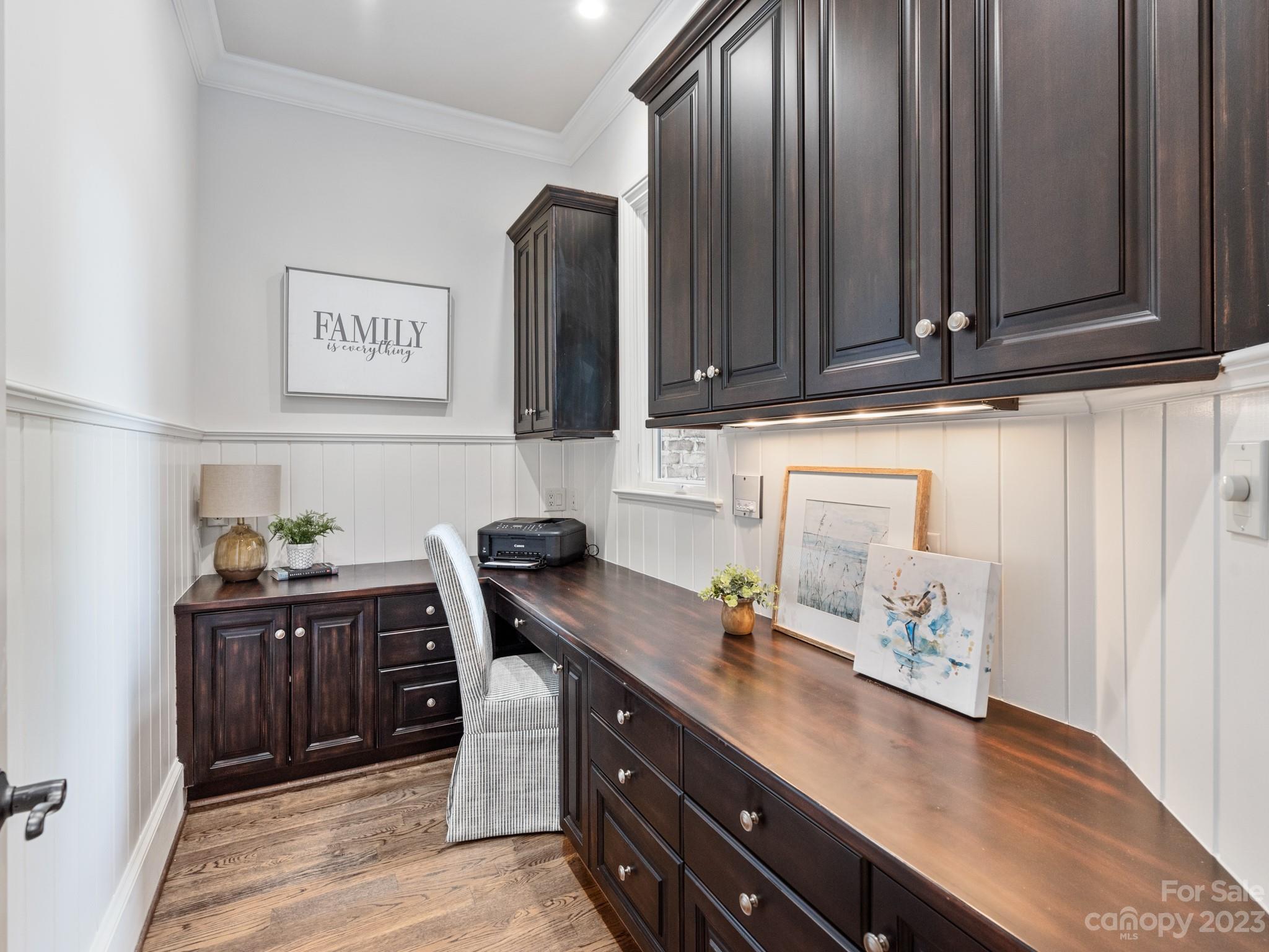 304 Eagle Bend Drive Waxhaw, NC 28173 - Photo 29 of 48 a kitchen with granite countertop a sink cabinets and stainless steel appliances