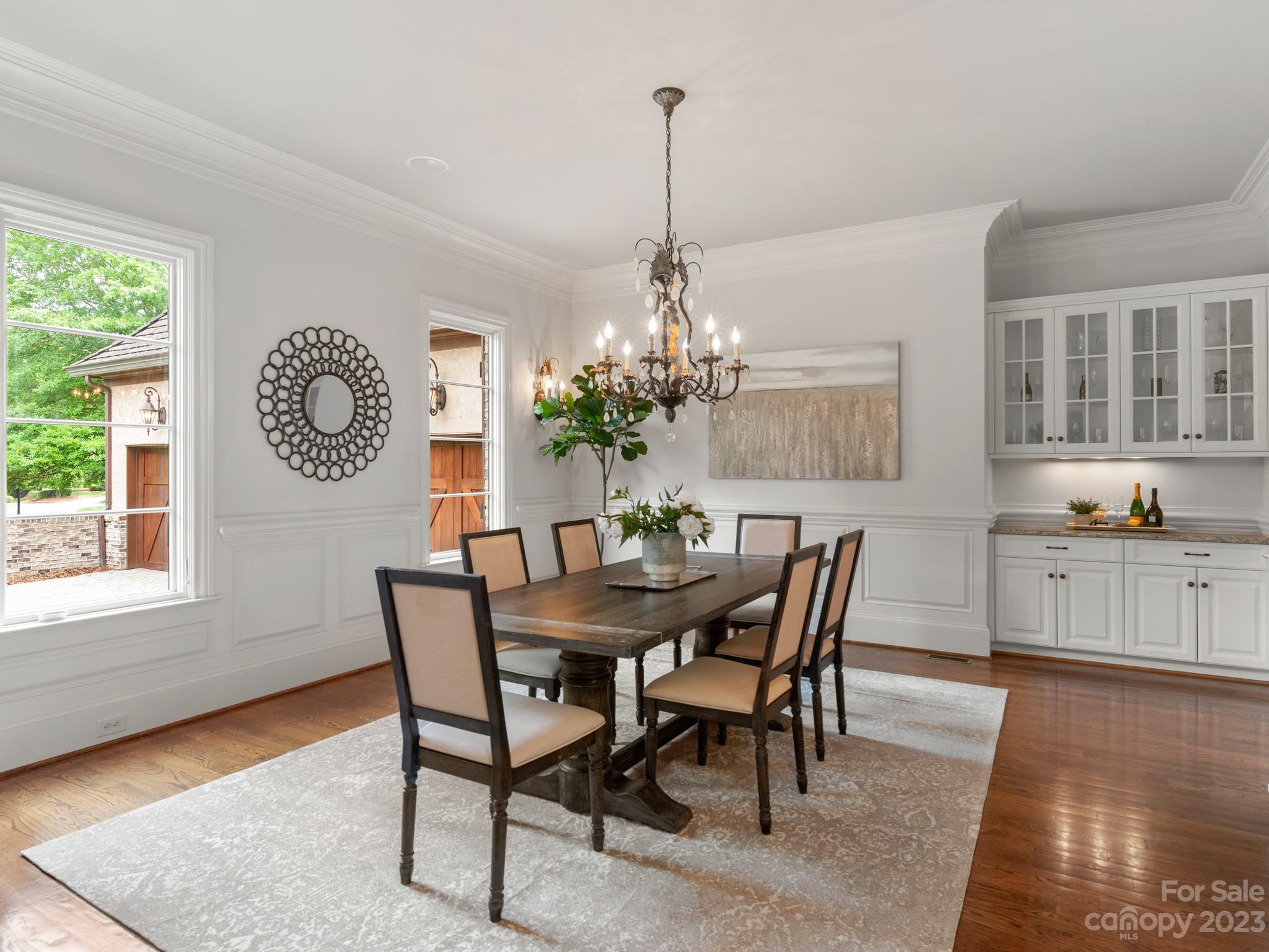 304 Eagle Bend Drive Waxhaw, NC 28173 - Photo 30 of 48 a view of a dining room with furniture window and wooden floor