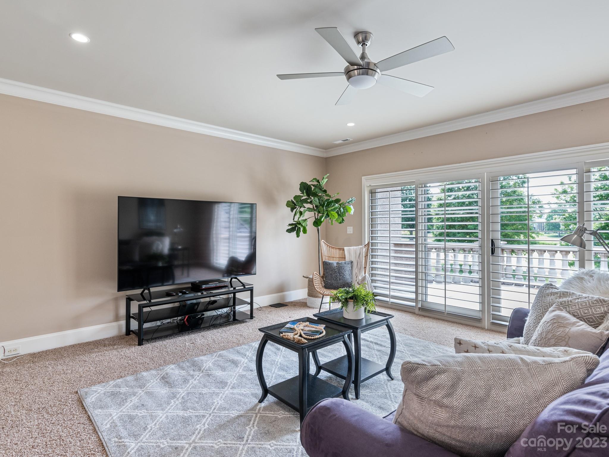 304 Eagle Bend Drive Waxhaw, NC 28173 - Photo 34 of 48 a living room with furniture and a flat screen tv