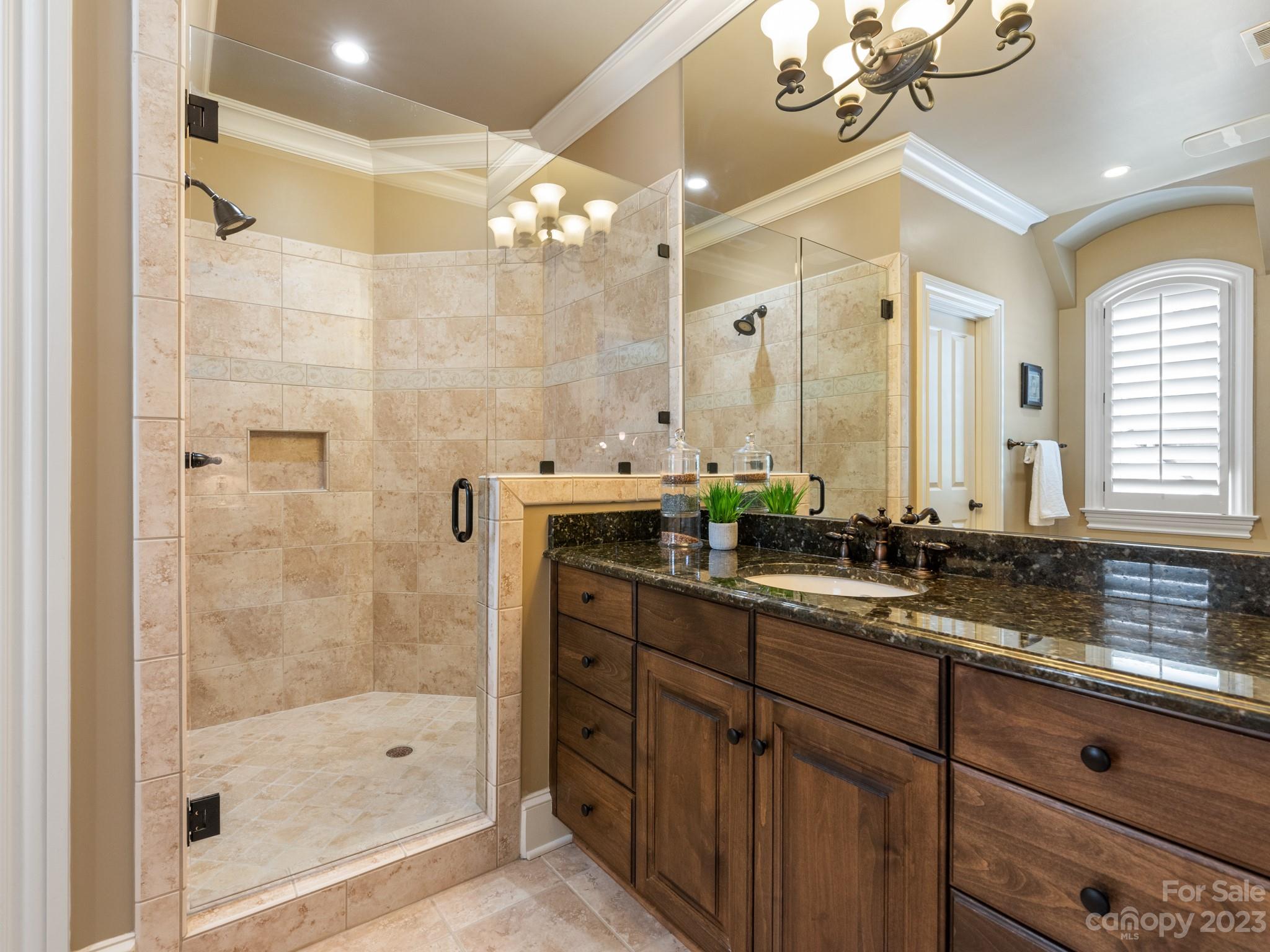 304 Eagle Bend Drive Waxhaw, NC 28173 - Photo 38 of 48 a bathroom with a double vanity sink mirror and shower