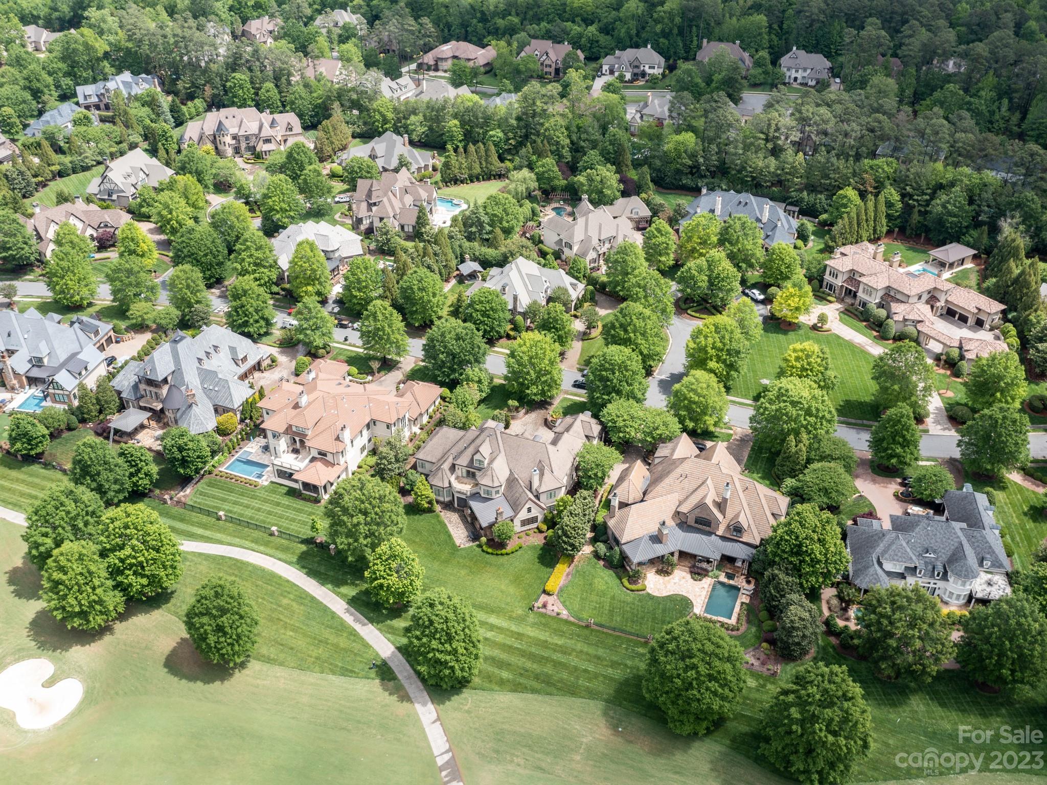 304 Eagle Bend Drive Waxhaw, NC 28173 - Photo 47 of 48 an aerial view of residential houses with outdoor space and trees