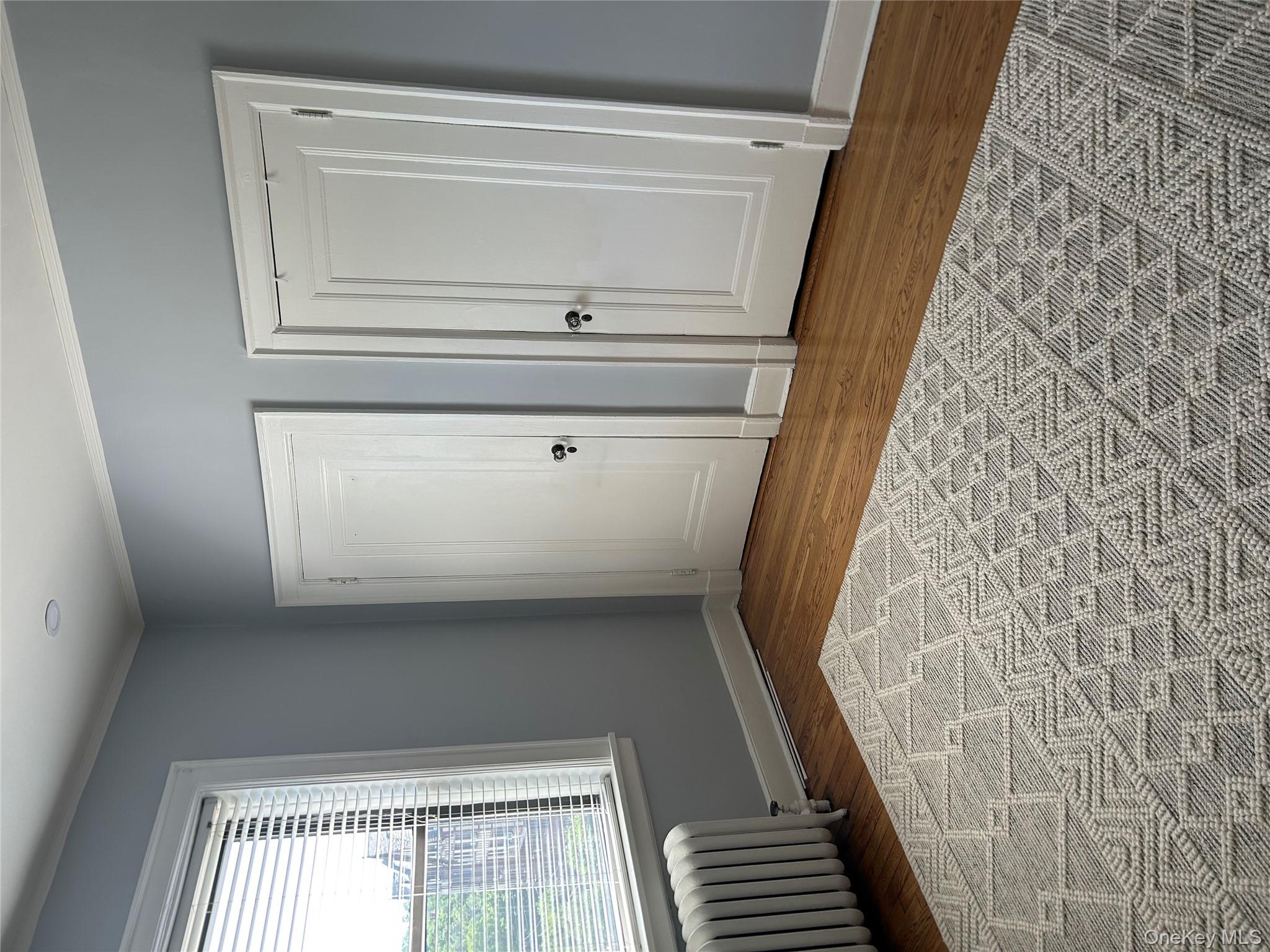 56 Pondfield Road West, Unit 4A Bronxville, NY 10708 - Photo 15 of 22 a view of an empty room and window