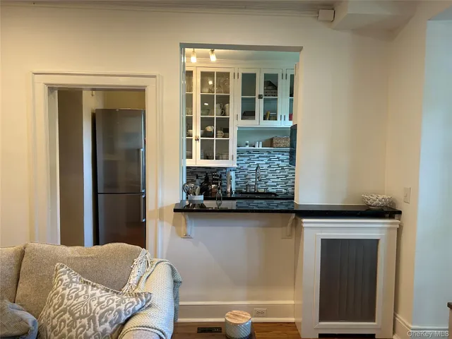 a living room with furniture and window