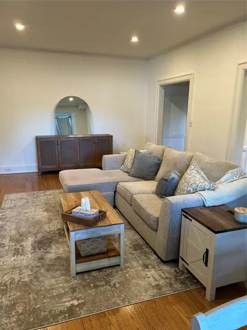a living room with furniture and a couch