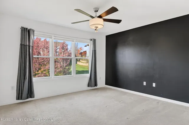 a bathroom with a sink vanity and a mirror