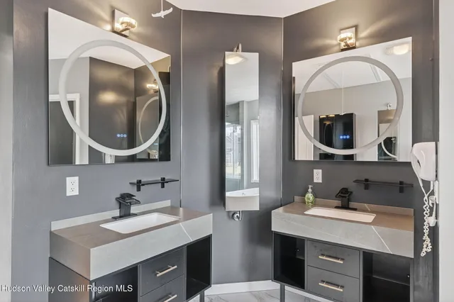 an empty room with a empty space and a ceiling fan