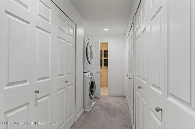 a bathroom with a toilet a sink and shower