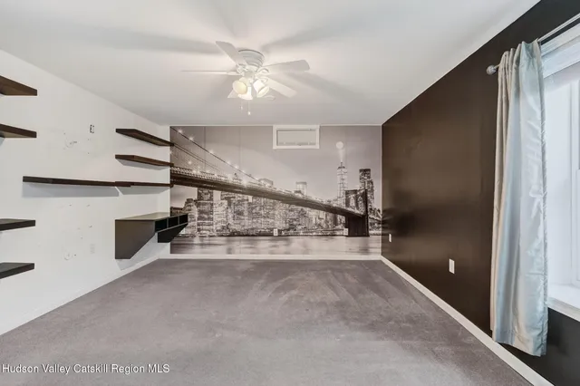 a view of balcony with wooden floor
