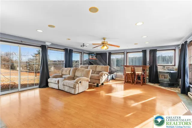 a view of a dining room with furniture window and outside view