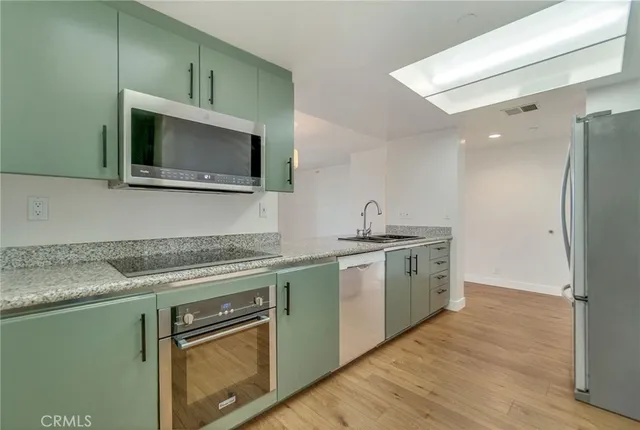 a view of a bathroom from the hallway