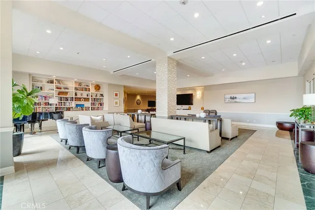 a view of parking garage with cars parked