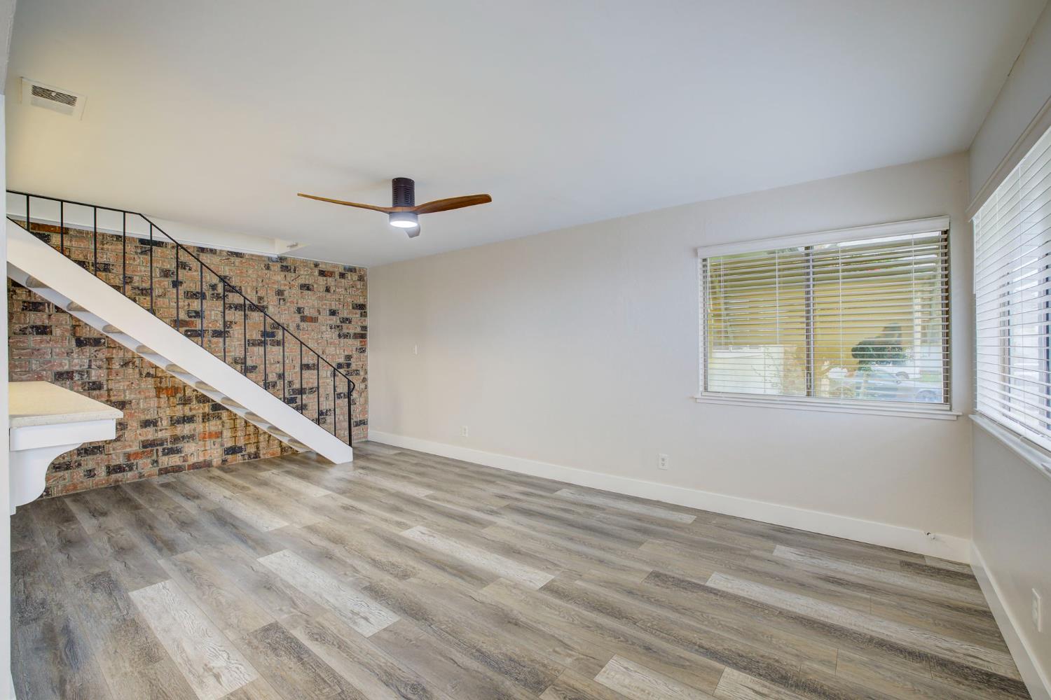 277 Sharp Circle, Unit 2 Roseville, CA 95678 - Photo 6 of 19 a view of an entryway with wooden floor