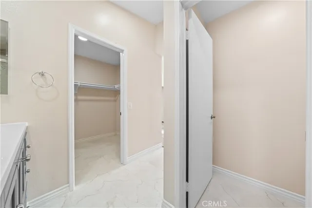 a view of an empty walk in closet