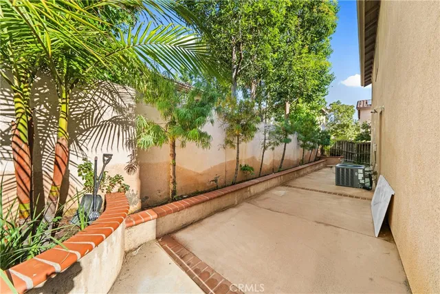 a house with trees in front of it