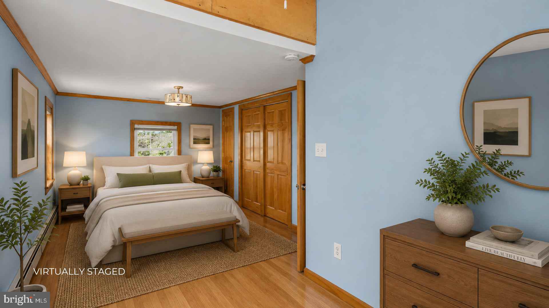 23 Cotton Road Levittown, PA 19057 - Photo 19 of 36 a bedroom with a bed and a potted plant